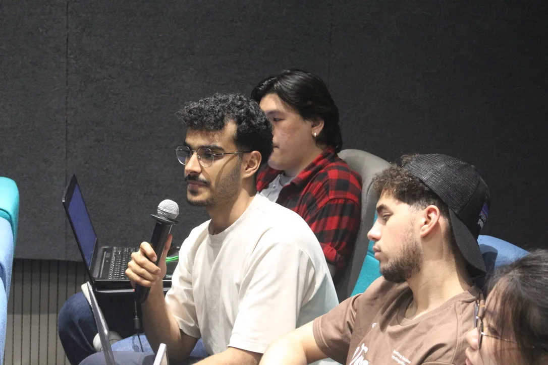 Attendee asking a question during Q&A