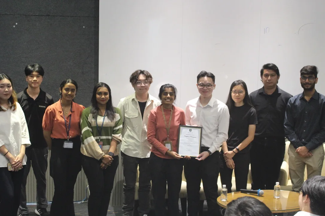 Group photo with certificate of appreciation