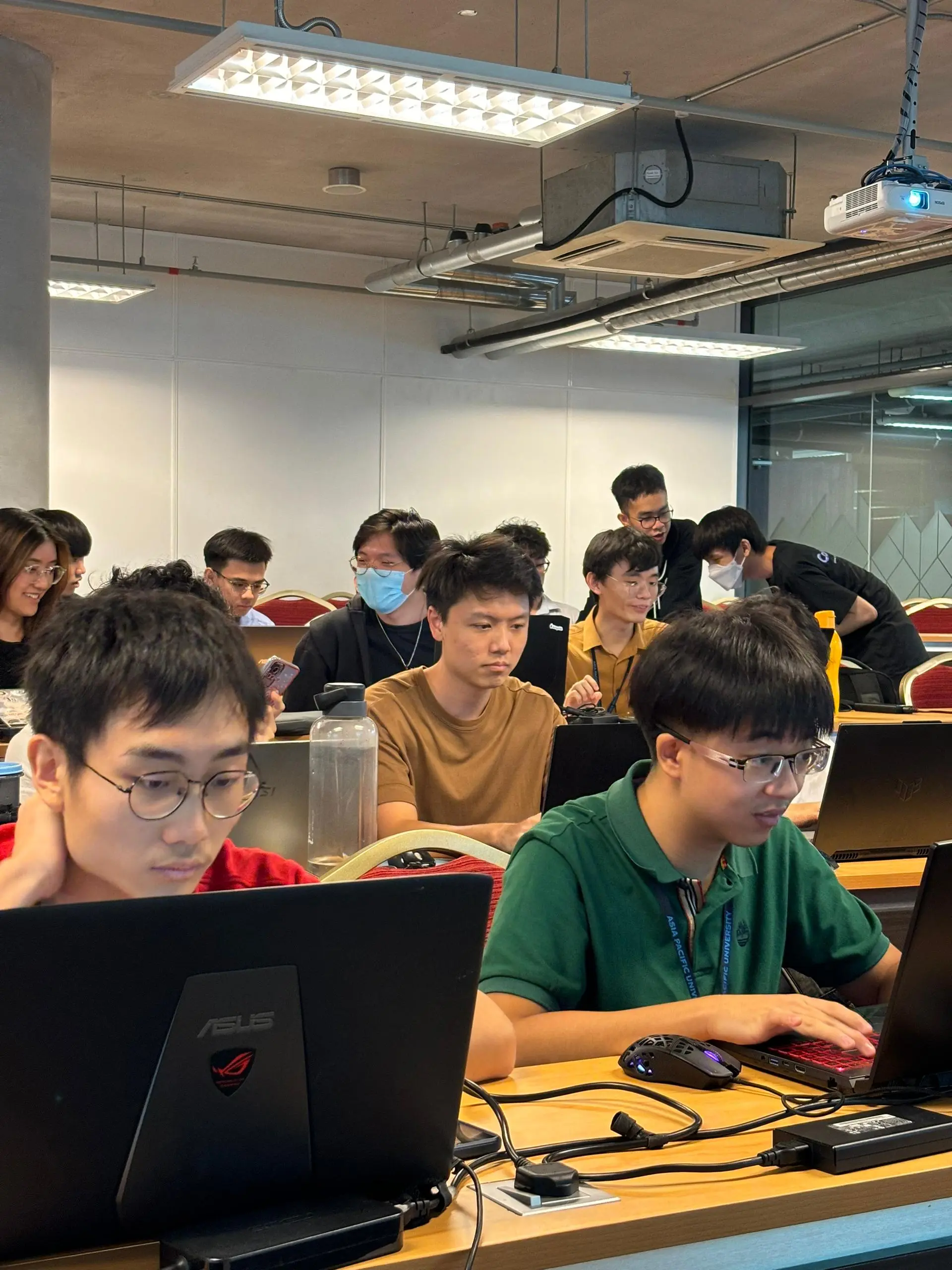 Participants coding on laptops