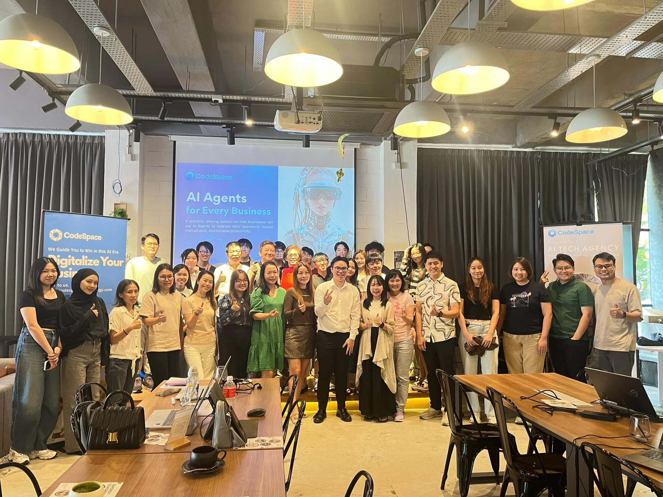 Fun group photo with thumbs up