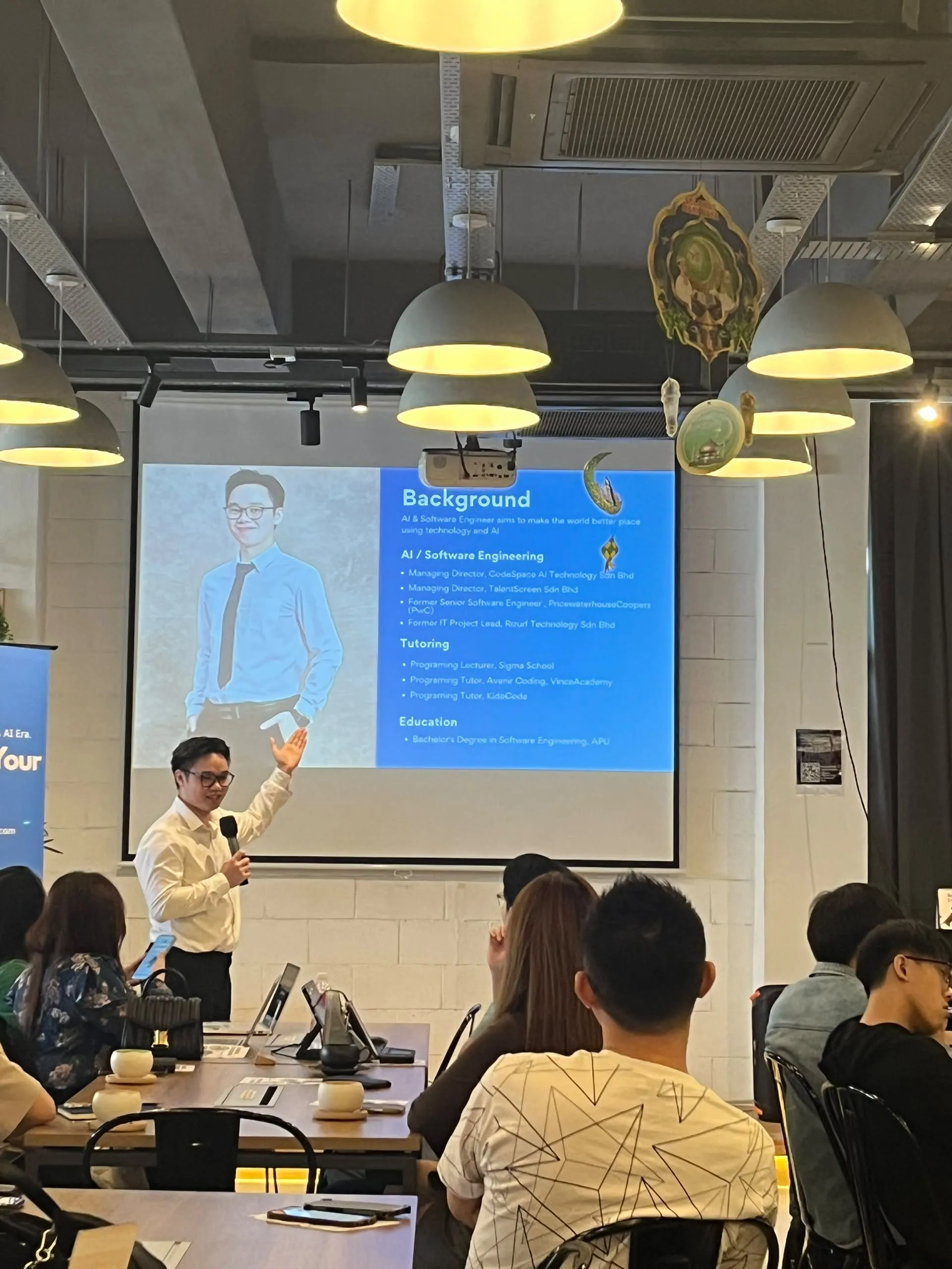 Trainer sharing speaker background